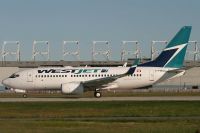 YUL070805_C-FWCC_B737-700(WL)_Wetjets.jpg